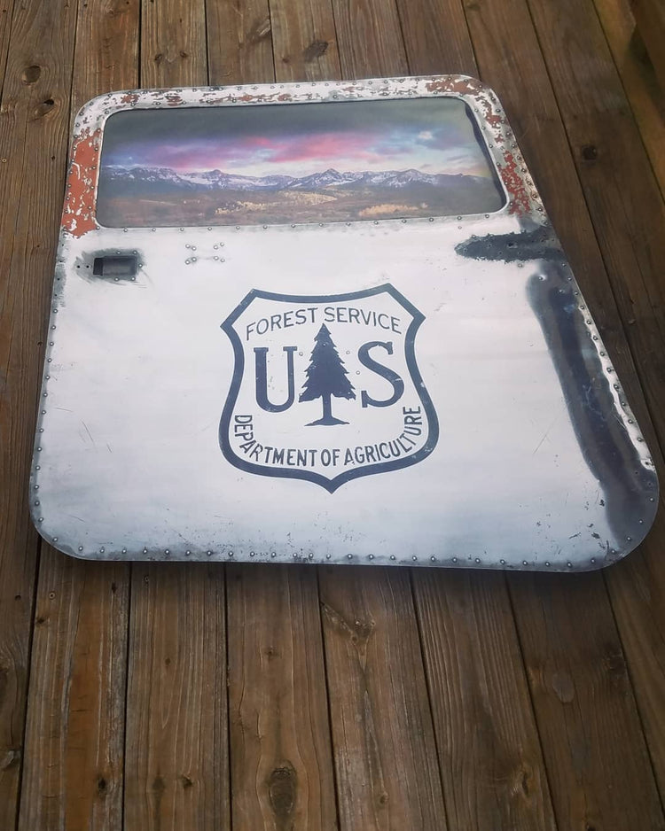 Vintage airplane door "Forest Service scene"