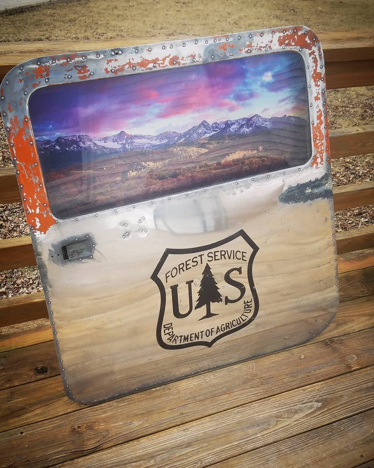 Vintage airplane door "Forest Service scene"